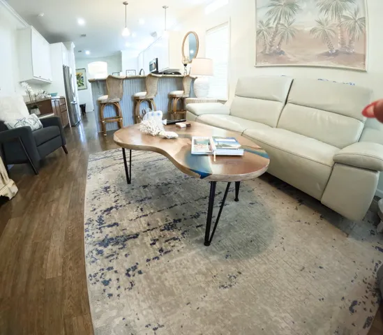 a living room with furniture and a couch