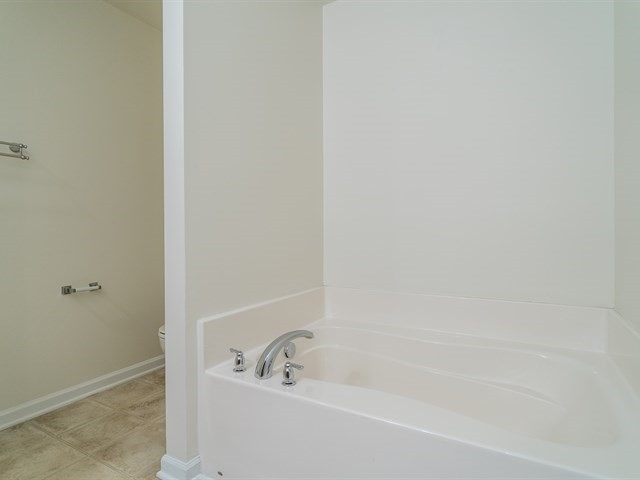 8506 Micollet Court Raleigh, NC 27613 - Photo 17 of 22 Master Bath