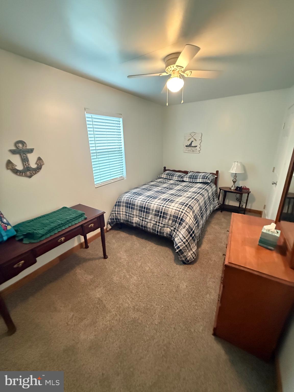 106 North Rock Ridge Lane Mount Storm, WV 26739 - Photo 5 of 78 a bedroom with bed and window