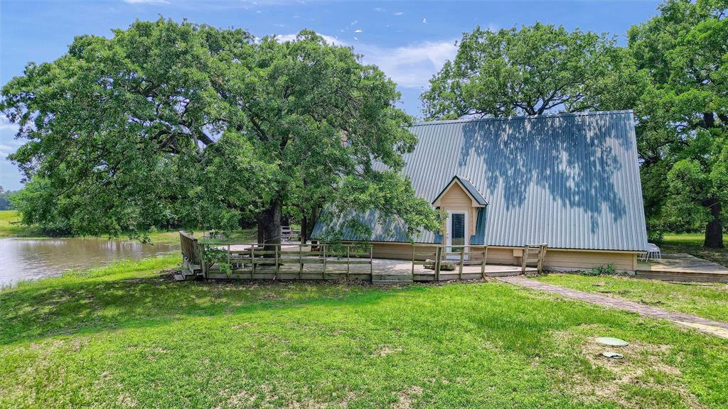 263 Rio Roxo Road Gordonville, TX 76245 - Photo 14 of 33 View of yard featuring a water view