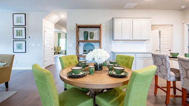 a bedroom with a bed and cabinet