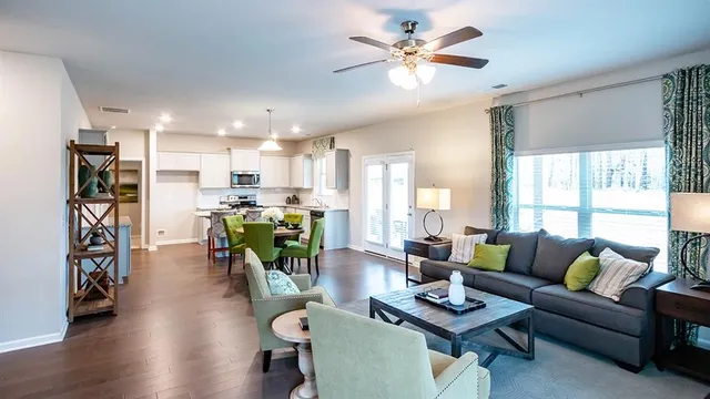 a bathroom with a toilet a sink and bathtub