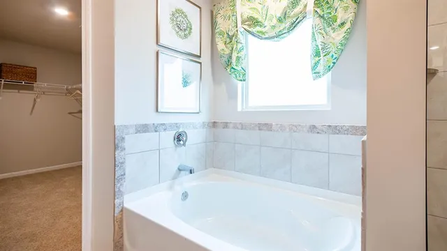 a bedroom with a bed and a table