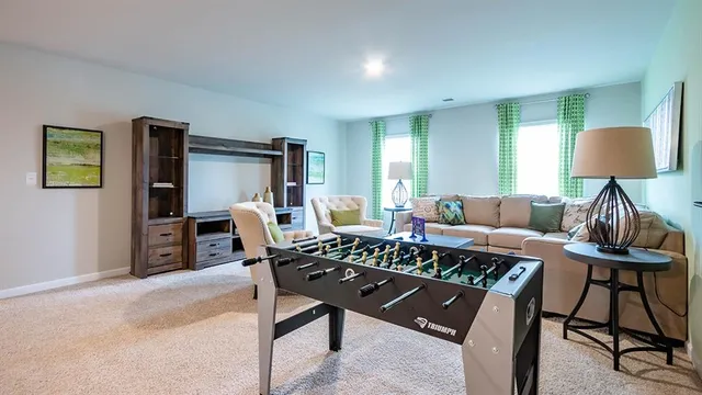 a bathroom with a toilet and a vanity