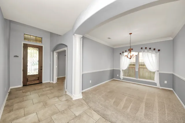 a view of an empty room and window