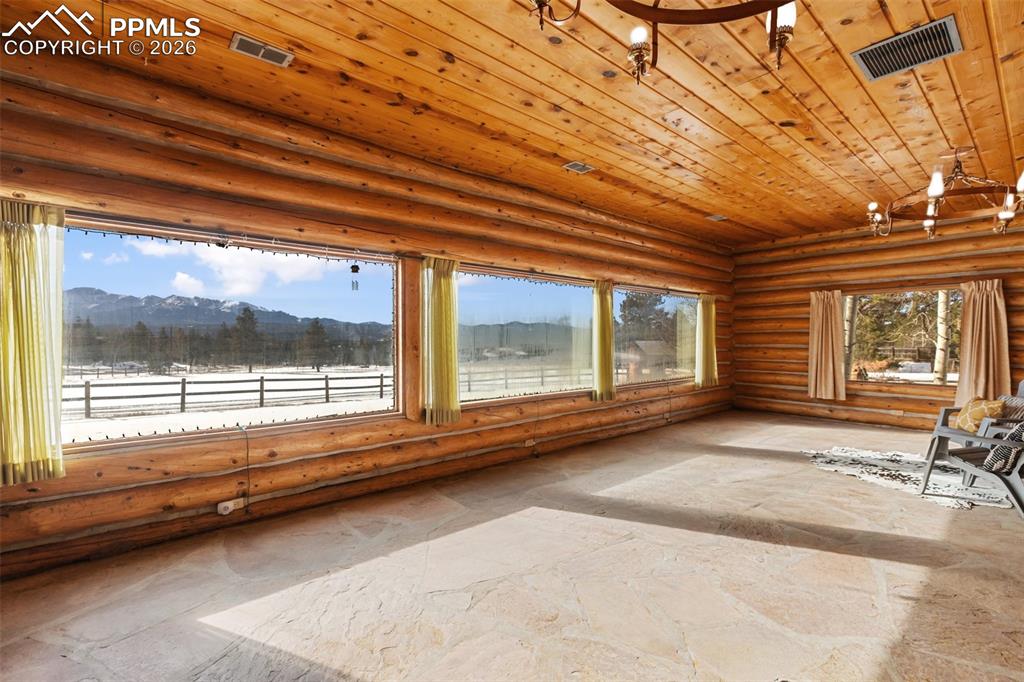 2300 Rampart Range Road Woodland Park, CO 80863 - Photo 13 of 45 a view of a room with a large window
