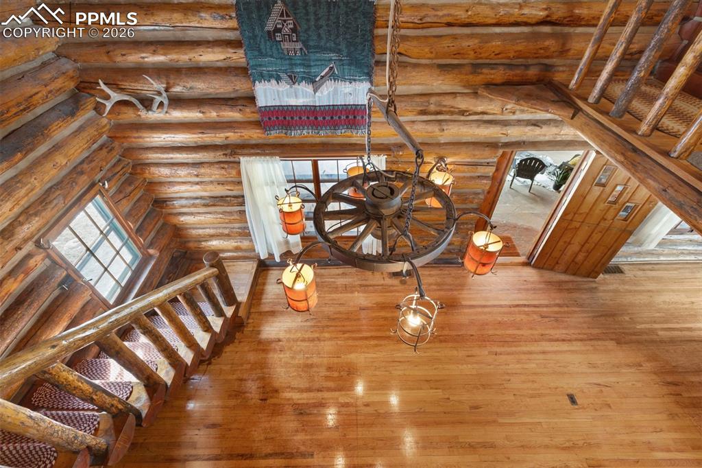 2300 Rampart Range Road Woodland Park, CO 80863 - Photo 25 of 45 a view of an entryway with a wooden door