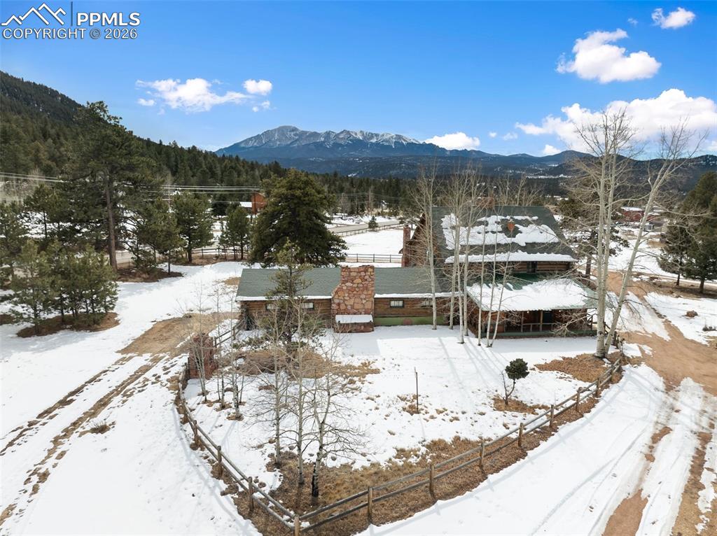 2300 Rampart Range Road Woodland Park, CO 80863 - Photo 44 of 45 a view of a swimming pool with a lake view