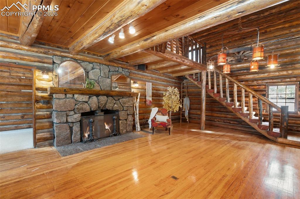 2300 Rampart Range Road Woodland Park, CO 80863 - Photo 5 of 45 a view of a storage room with wooden floor