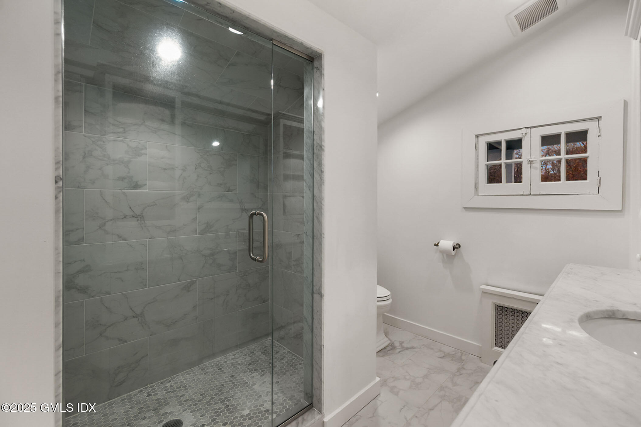 45 Burying Hill Road, Unit COTTAGE Greenwich, CT 06831 - Photo 11 of 19 a bathroom with a shower and a toilet