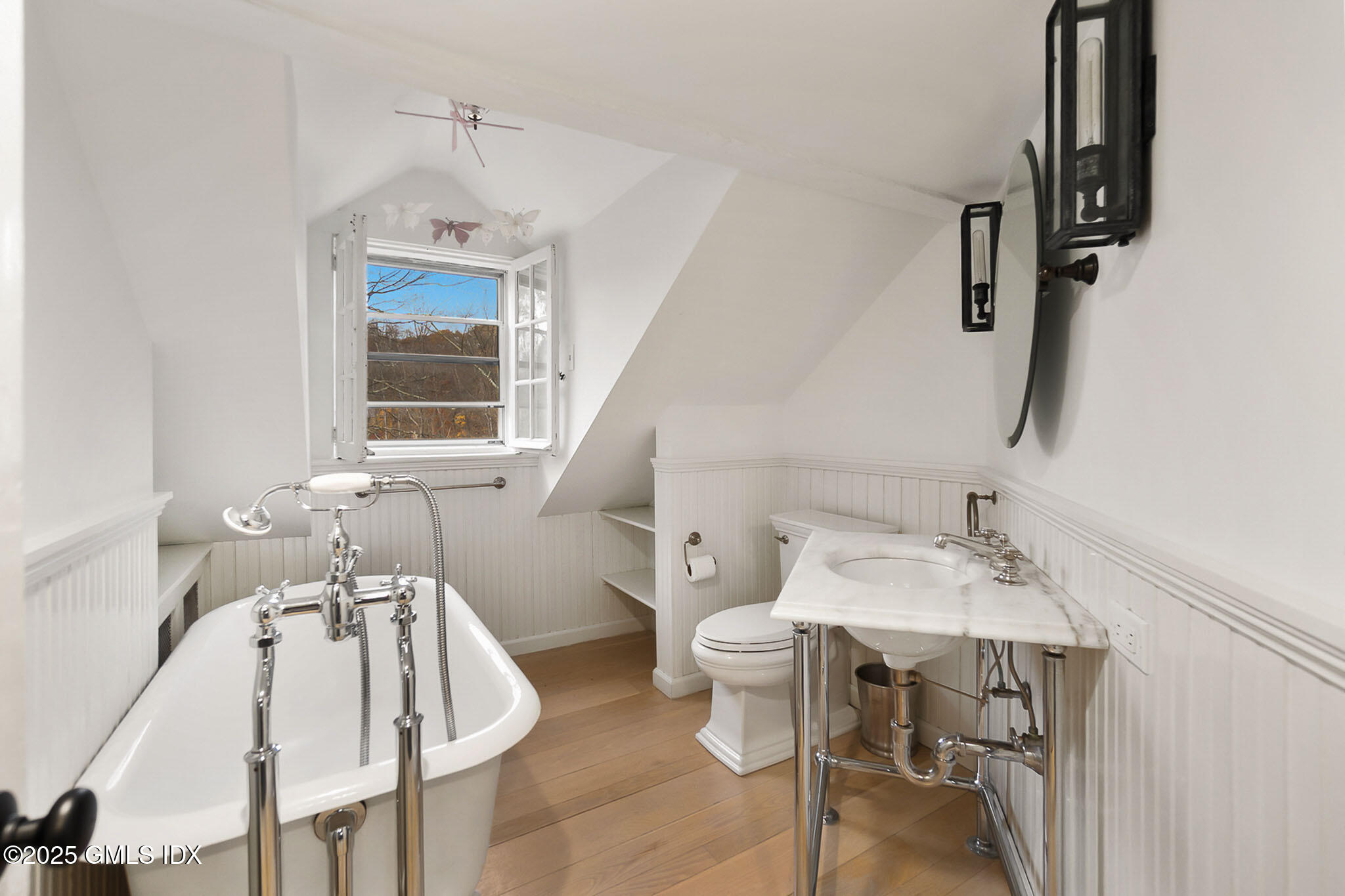 45 Burying Hill Road, Unit COTTAGE Greenwich, CT 06831 - Photo 13 of 19 a dining room with furniture and window