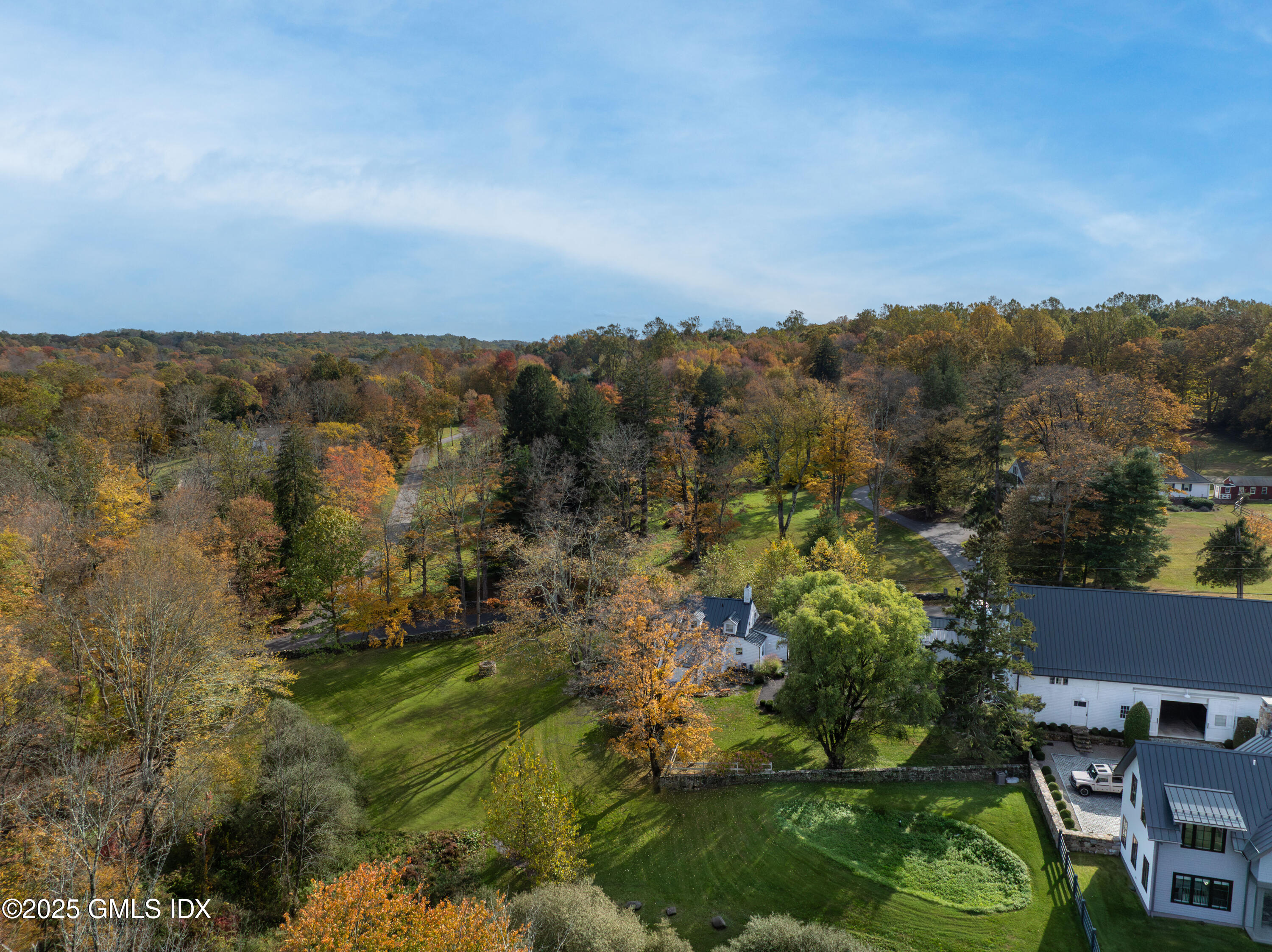 45 Burying Hill Road, Unit COTTAGE Greenwich, CT 06831 - Photo 17 of 19 an aerial view of multiple house