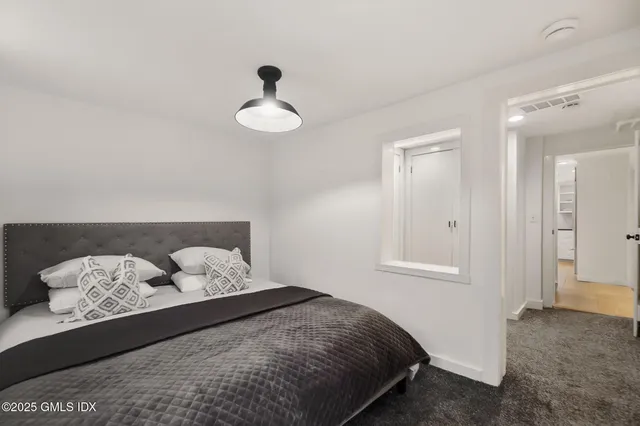 a bathroom with a shower and a toilet