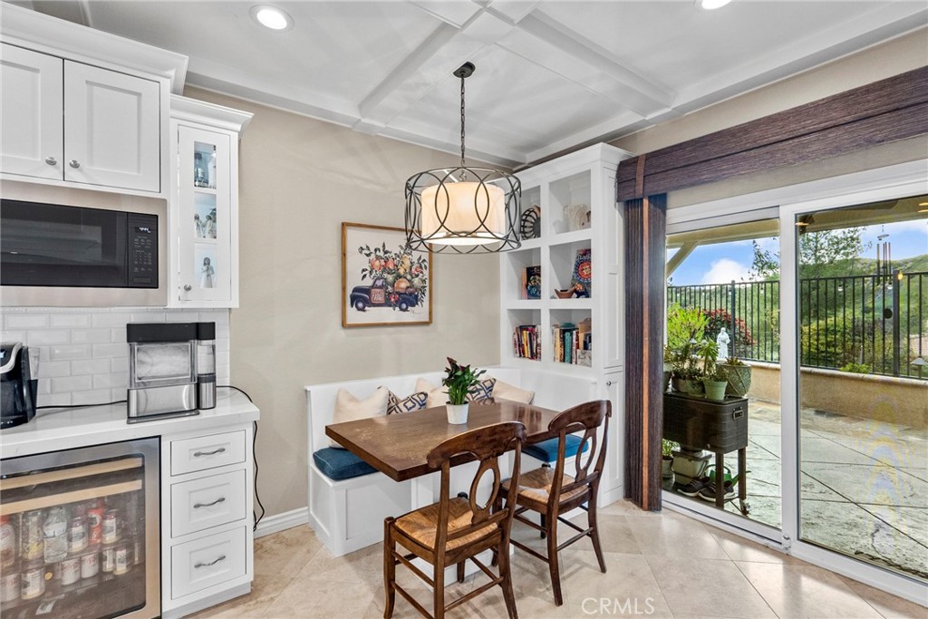 29859 Cashmere Place Castaic, CA 91384 - Photo 18 of 48 a dining room with furniture a chandelier and window