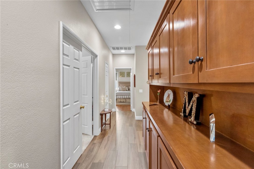 29859 Cashmere Place Castaic, CA 91384 - Photo 20 of 48 a view of a hallway with granite countertop a couch