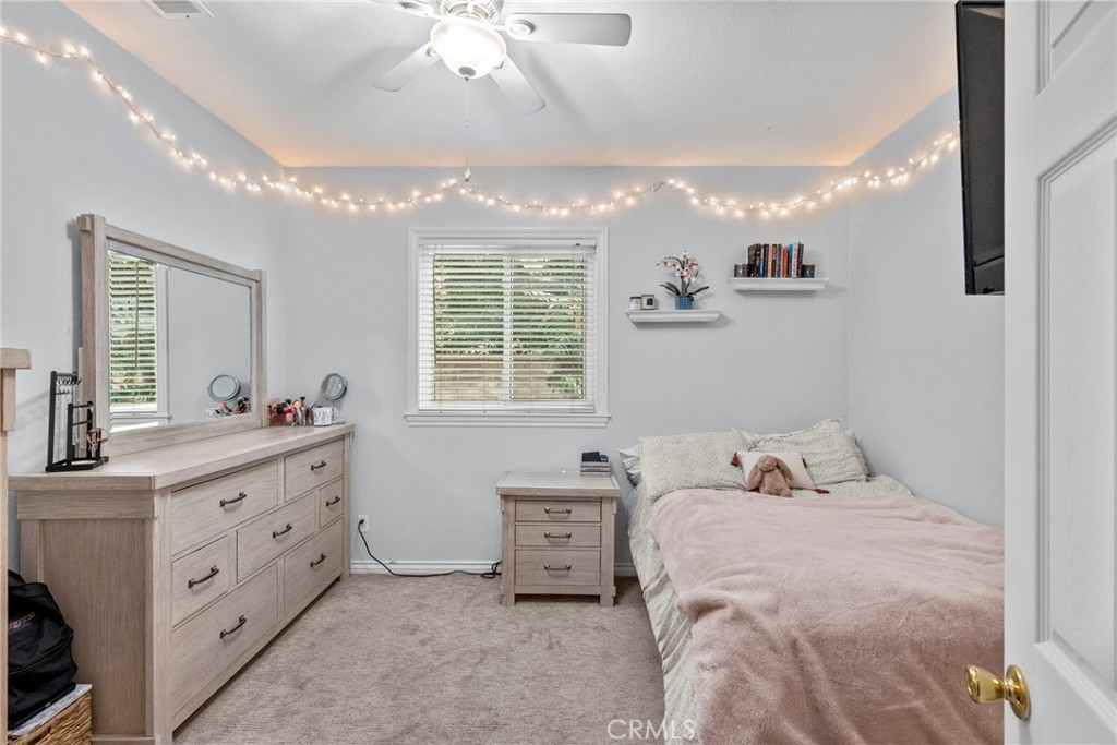 29859 Cashmere Place Castaic, CA 91384 - Photo 26 of 48 a bedroom with a bed and a dresser