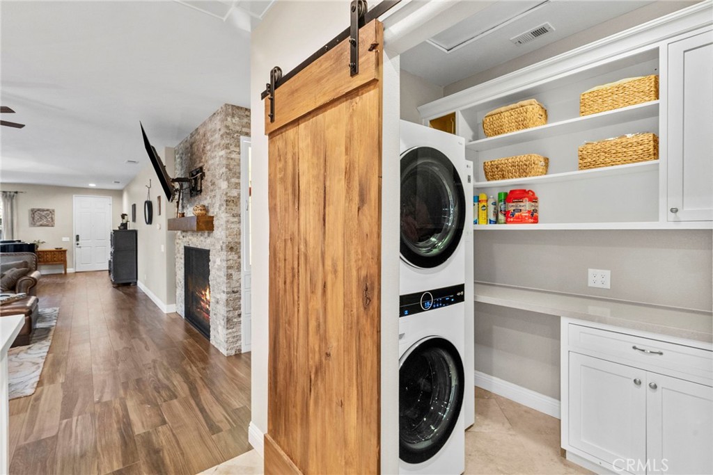 29859 Cashmere Place Castaic, CA 91384 - Photo 29 of 48 a view of a storage and utility room with washer and dryer