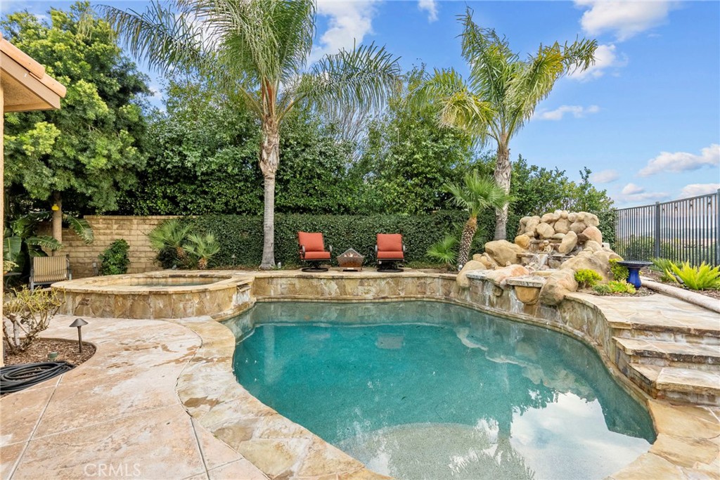 29859 Cashmere Place Castaic, CA 91384 - Photo 31 of 48 a view of a swimming pool with a patio