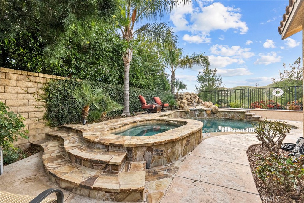 29859 Cashmere Place Castaic, CA 91384 - Photo 32 of 48 a swimming pool with outdoor seating and patio