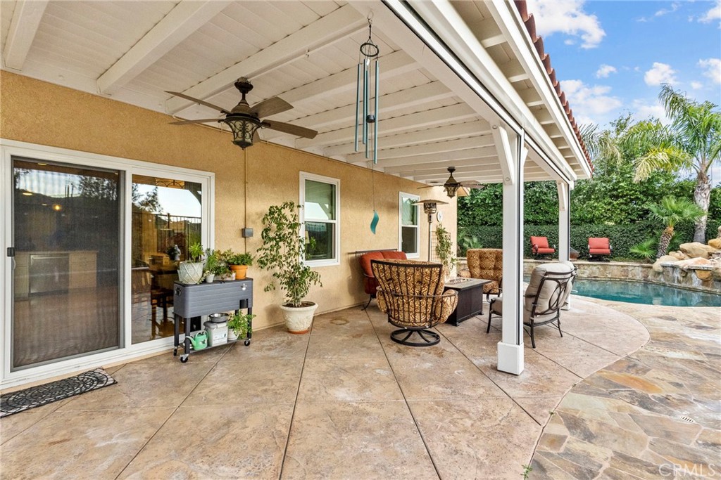 29859 Cashmere Place Castaic, CA 91384 - Photo 34 of 48 a living room with patio furniture and a potted plant