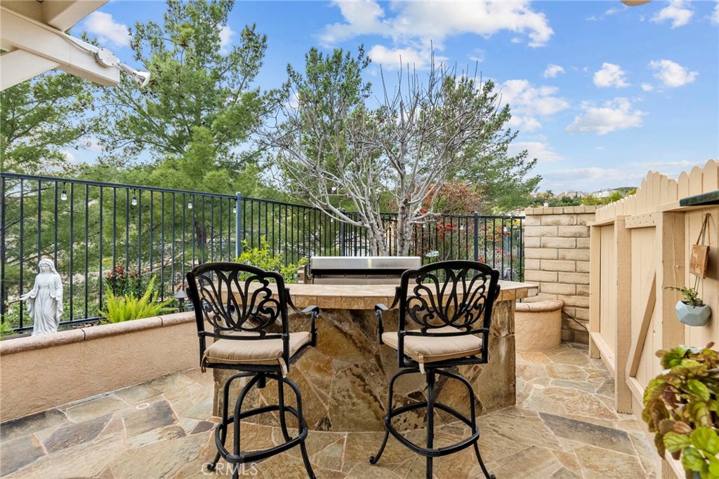 29859 Cashmere Place Castaic, CA 91384 - Photo 38 of 48 a view of balcony with wooden floor and outdoor seating