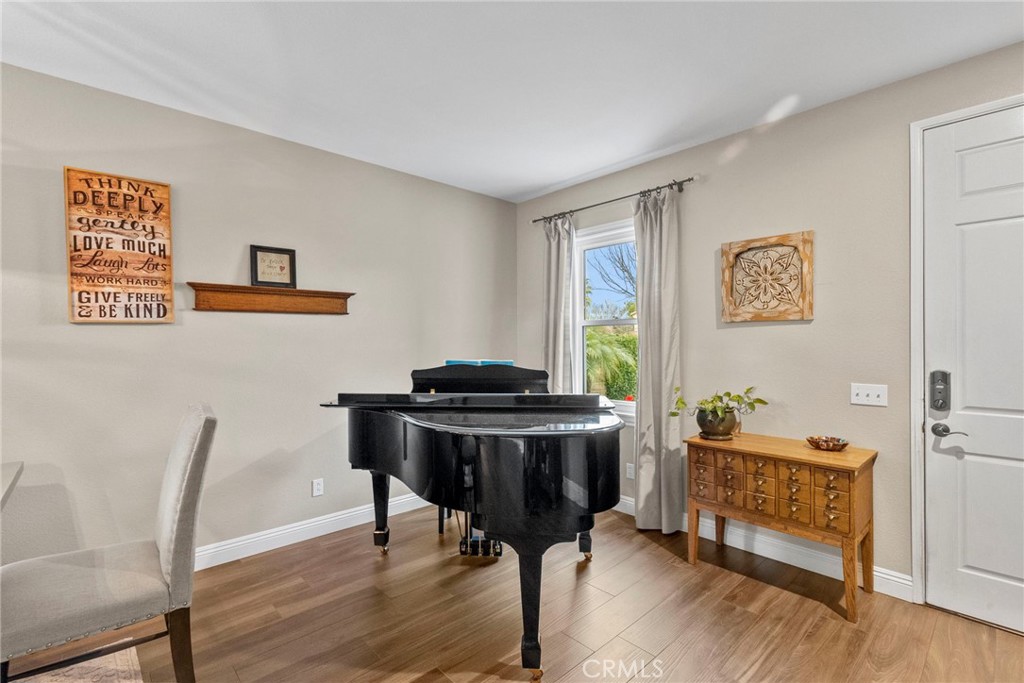 29859 Cashmere Place Castaic, CA 91384 - Photo 6 of 48 a room with furniture and wooden floor