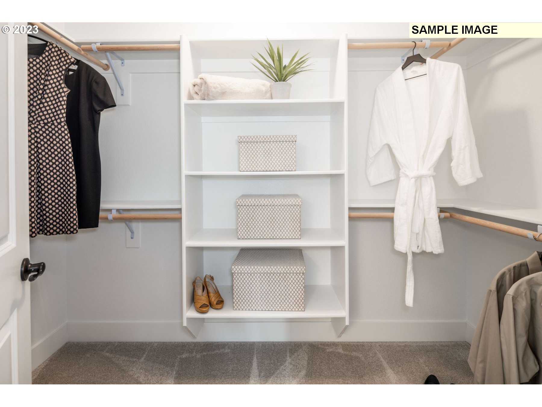 17535 Northwest 7th Avenue Ridgefield, WA 98642 - Photo 13 of 32 a view of walk in closet with clothes and shoes