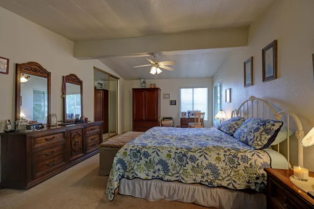 a bathroom with a sink double vanity and a mirror