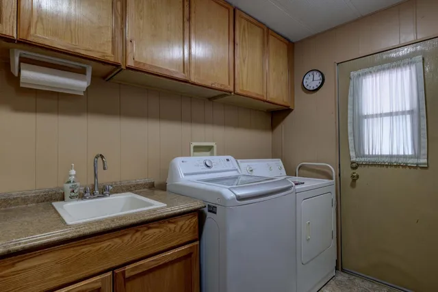 a view of backyard with a small cabin