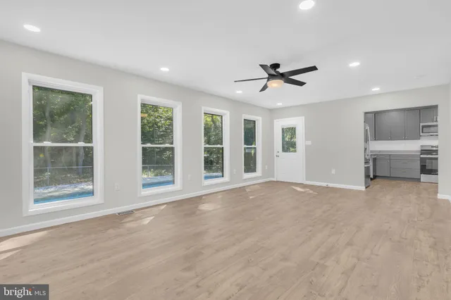 an empty room with windows