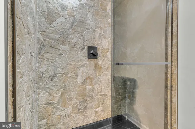 an aerial view of a houses with a yard