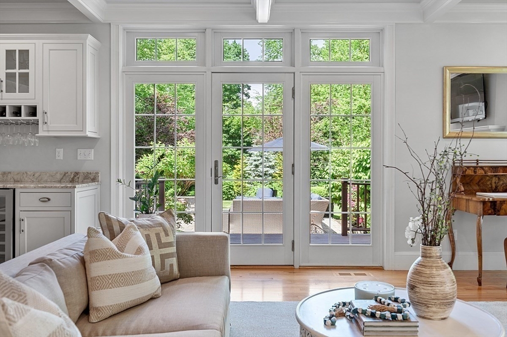 25 Shade Street Lexington, MA 02421 - Photo 12 of 42 a living room with furniture and a window