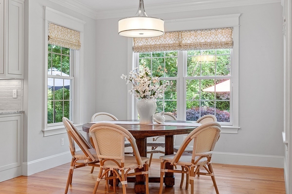 25 Shade Street Lexington, MA 02421 - Photo 13 of 42 a view of a dining room with furniture window and wooden floor