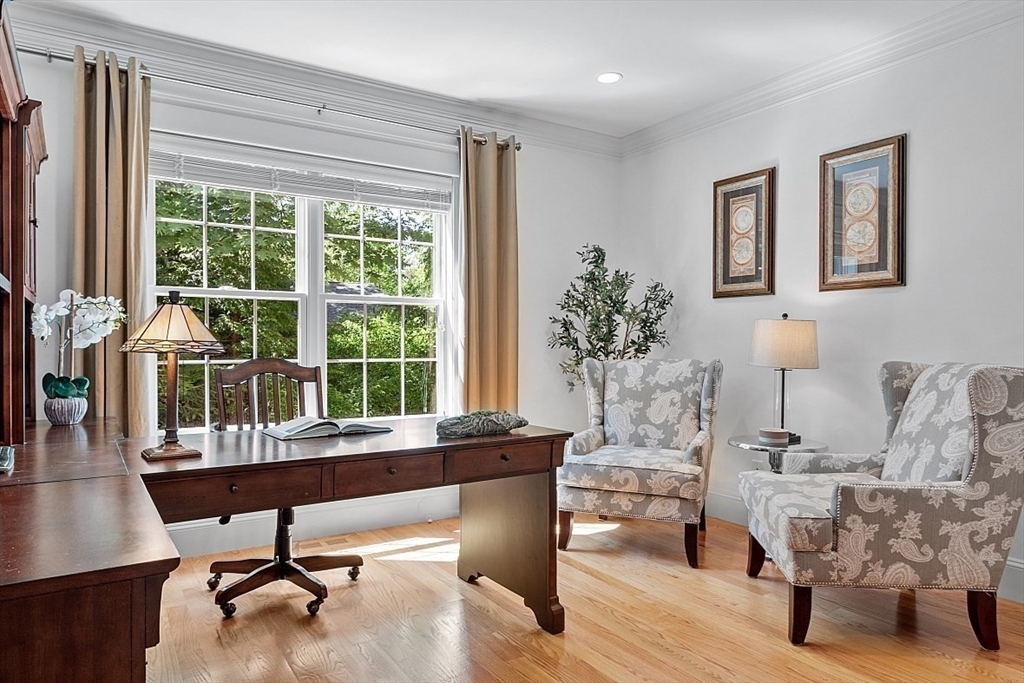 25 Shade Street Lexington, MA 02421 - Photo 23 of 42 a living room with furniture and a window