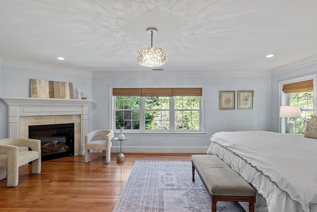 25 Shade Street Lexington, MA 02421 - Photo 27 of 42 a living room with furniture and a fireplace