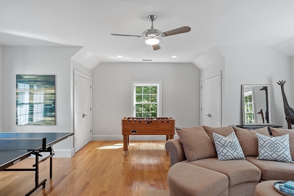 25 Shade Street Lexington, MA 02421 - Photo 34 of 42 a living room with furniture and a window