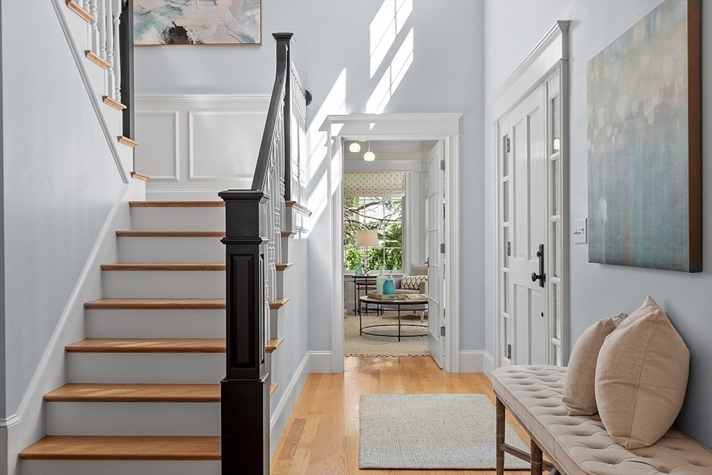 25 Shade Street Lexington, MA 02421 - Photo 5 of 42 a view of entryway and hall with wooden floor