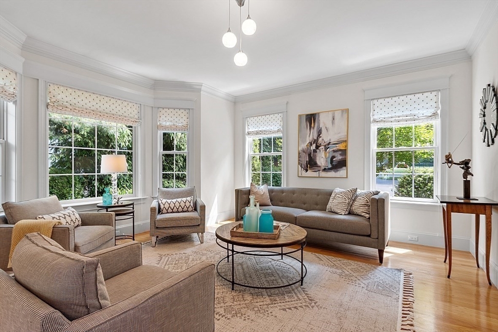 25 Shade Street Lexington, MA 02421 - Photo 6 of 42 a living room with furniture and a large window