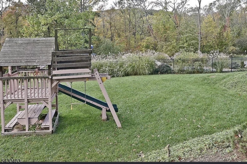 77 Taylortown Road Montville, NJ 07045 - Photo 9 of 11 a view of a park with slide