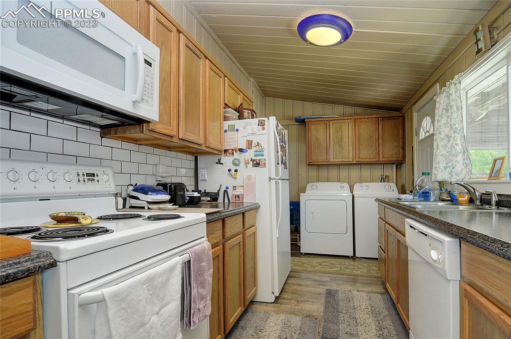 20 Main Street Silver Cliff, CO 81252 - Photo 11 of 28 a kitchen with refrigerator and cabinets