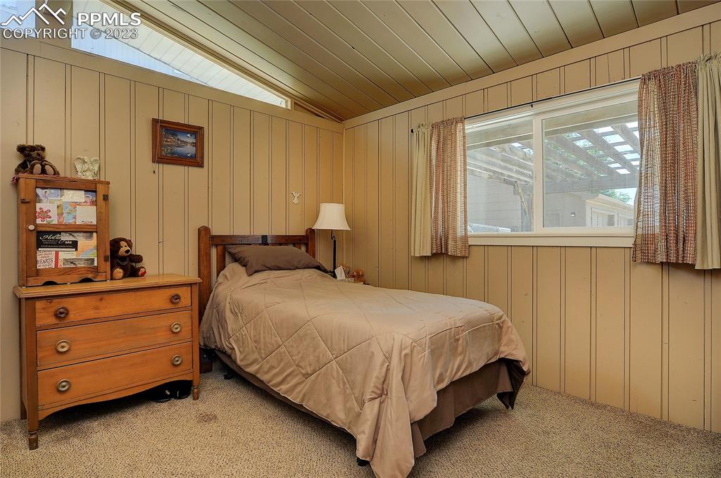 20 Main Street Silver Cliff, CO 81252 - Photo 13 of 28 a bedroom with a bed and a dresser
