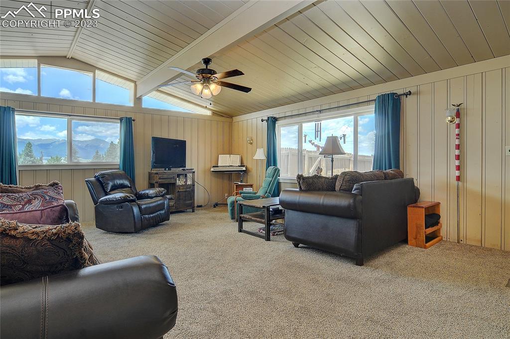 20 Main Street Silver Cliff, CO 81252 - Photo 3 of 28 a living room with furniture and a large window