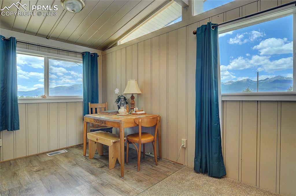 20 Main Street Silver Cliff, CO 81252 - Photo 6 of 28 a view of a dining room with furniture window and outside view