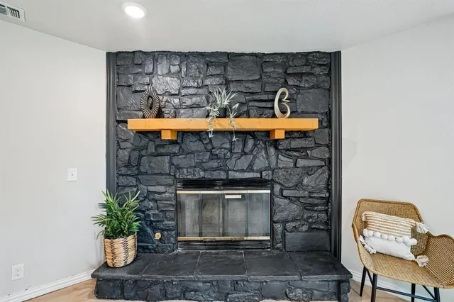 a room with furniture and a fireplace