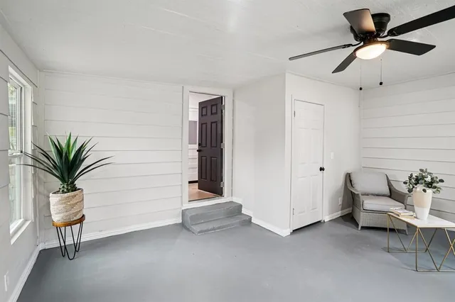 a view of room with workspace and a window