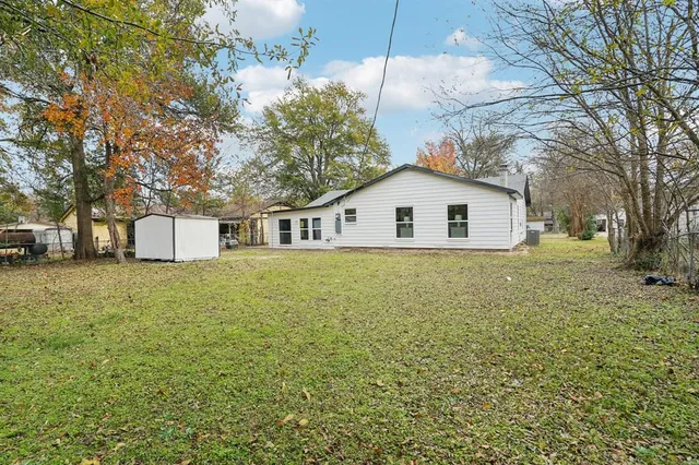 a house view with a garden space