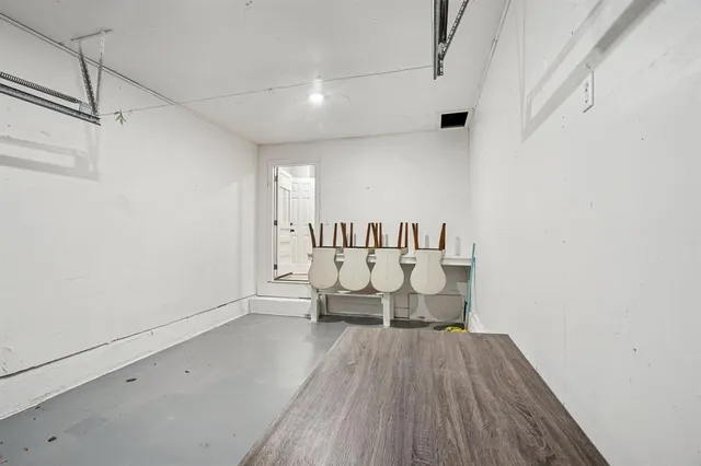 a view of wooden floor in a bathroom