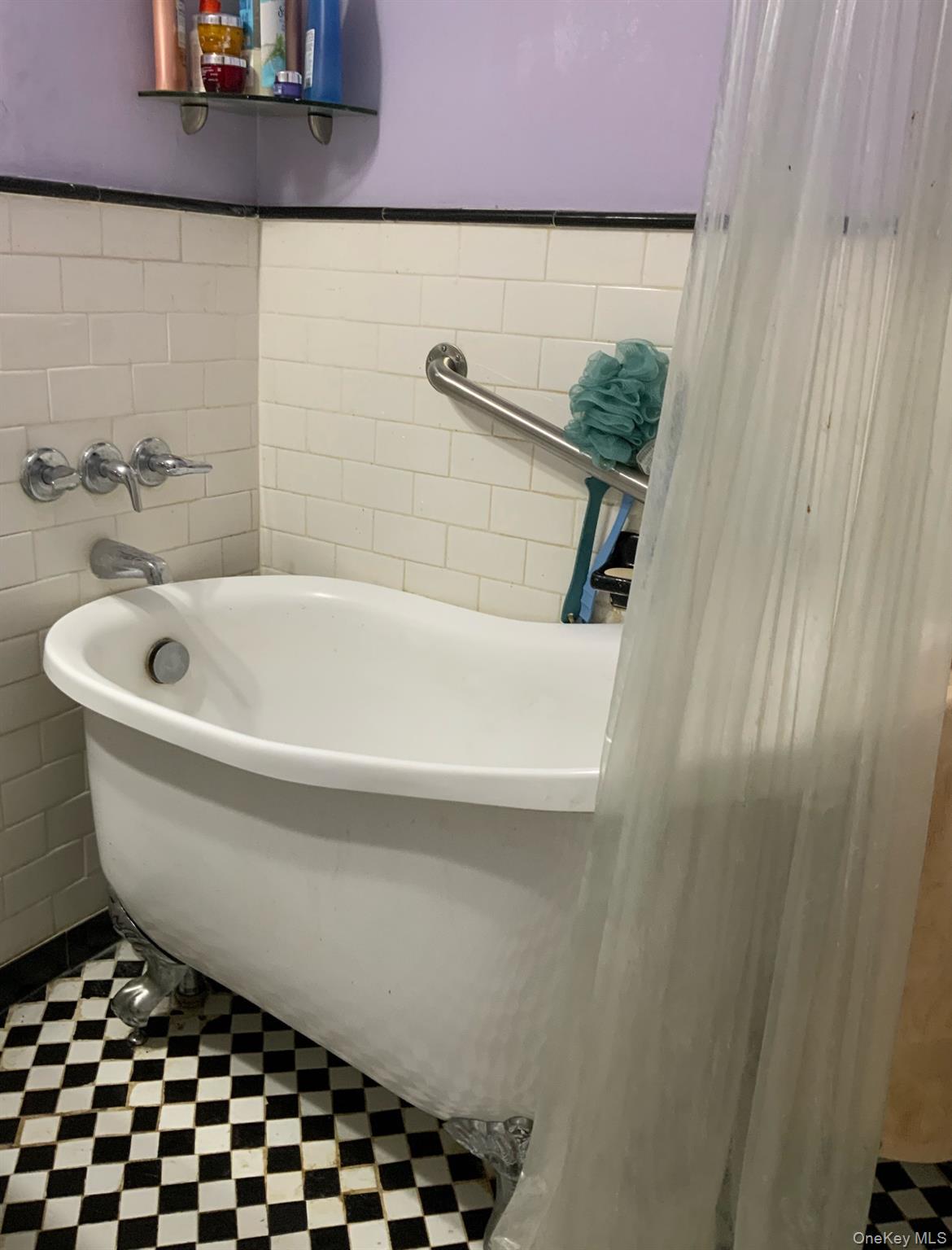 2261 Palmer Avenue, Unit 2A New Rochelle, NY 10801 - Photo 10 of 12 Full bath featuring a soaking tub, tile patterned floors, and tile walls