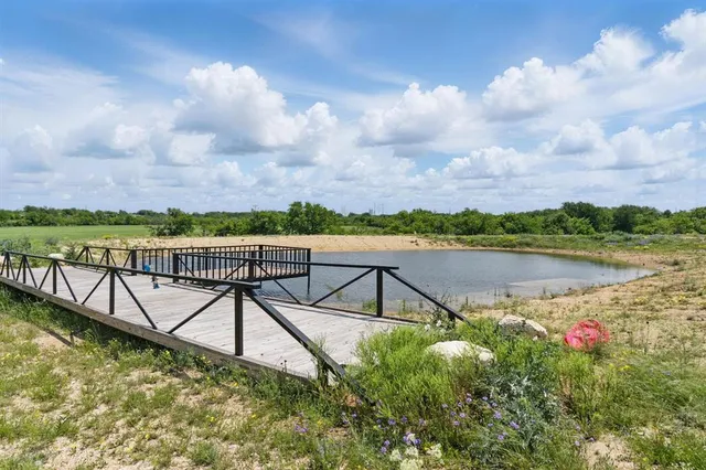 a view of a lake with a terrace