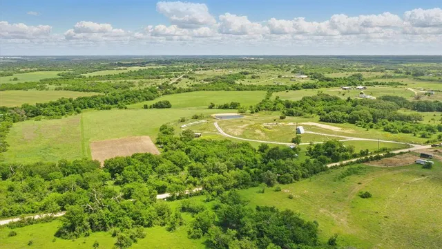 a view of an ocean and city